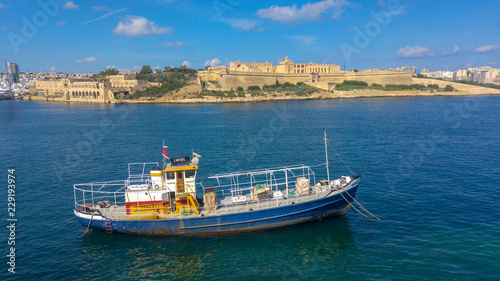 Boat in front of Manoel Island  Malta