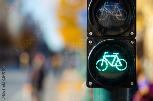 Photography Close-up of a bicycle traffic light showing a green signal, indicating that cyclists can proceed
