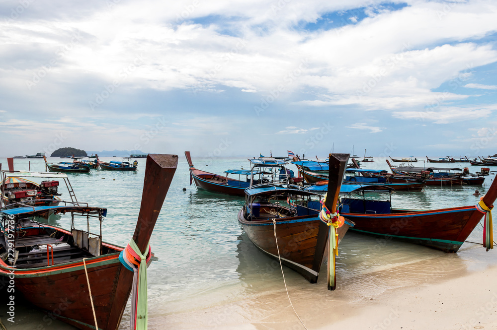 long tail boat is Clear water and blue sky. Lipe island, Thailand.. long tail boat is Clear water and blue sky. Lipe island, Thailand..