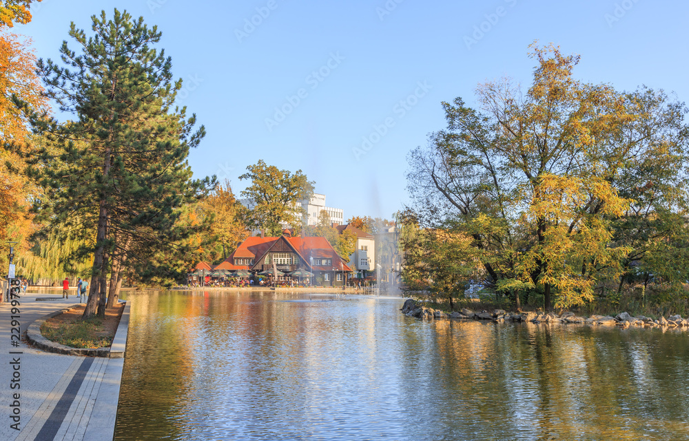Opole - Autumn view of Barlicki  Pond near the Piast Tower and amphitheater