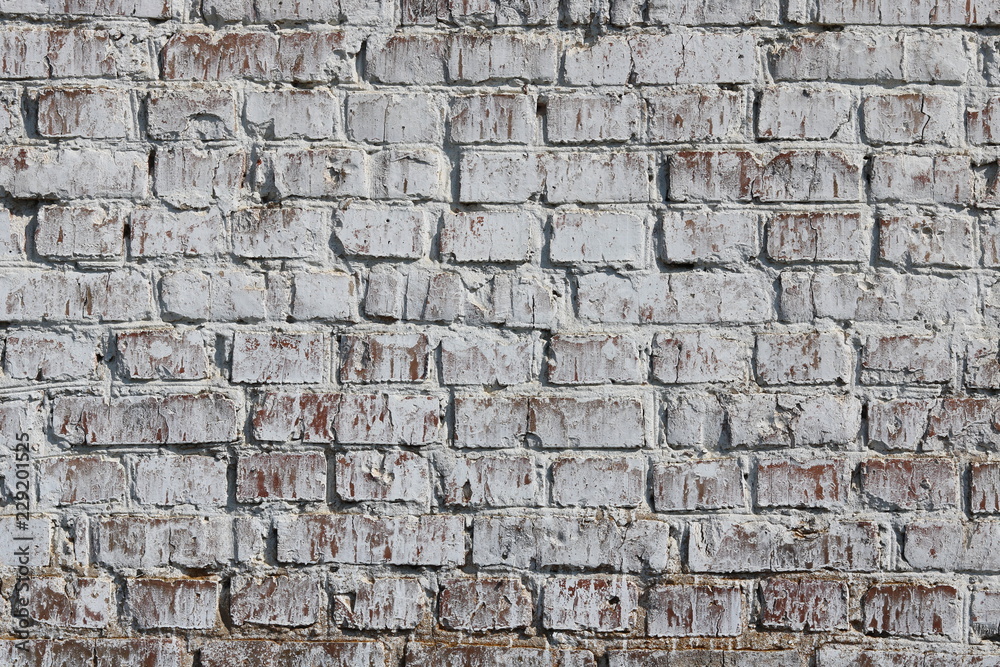 Old wall made of red brick, painted white in loft style for modern designer interior of room, bar or restaurant Old wall made of red brick, painted white in loft style for modern designer interior of room, bar or restaurant
