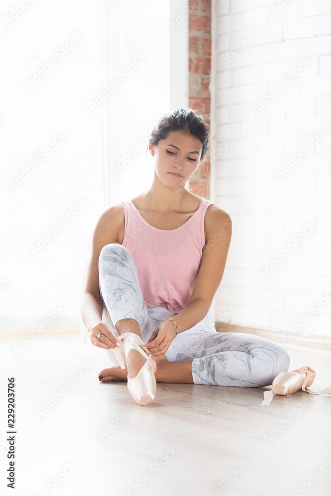 Premium Photo | Ballet dancer or ballerina feet getting ready suffering  from sports injury sit on studio floor creative artist with passion and  love for dance preparing for training and exercise wrapping