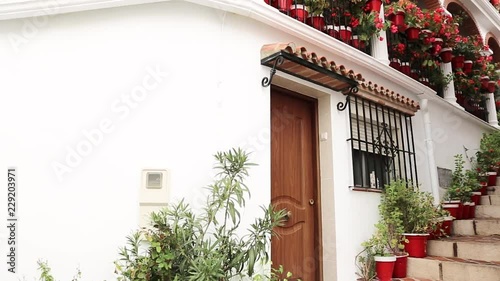 Beautiful view of a typically Spanish street Andalusia Costa del Sol Malaga Mijas Pueblo Spain