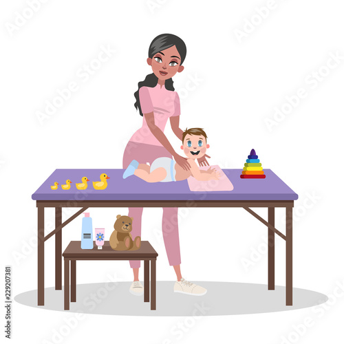 Woman doing body massage for a small baby