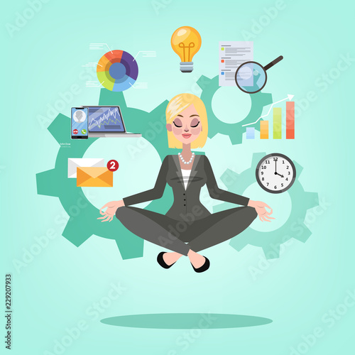Business woman in lotus pose having break at work