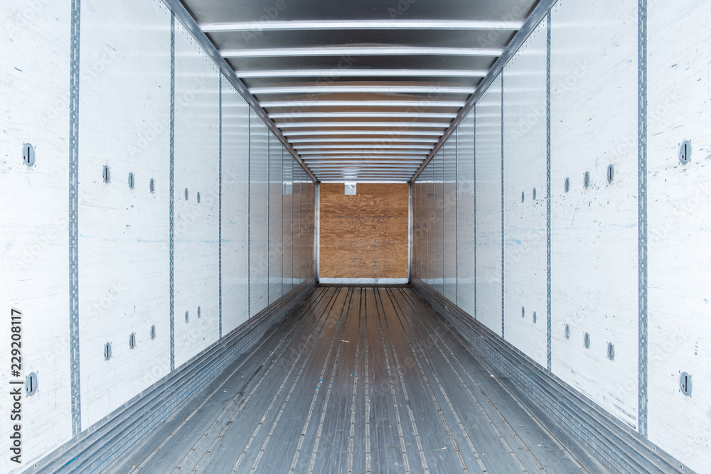 Interior view of empty semi truck dry van commercial trailer Stock