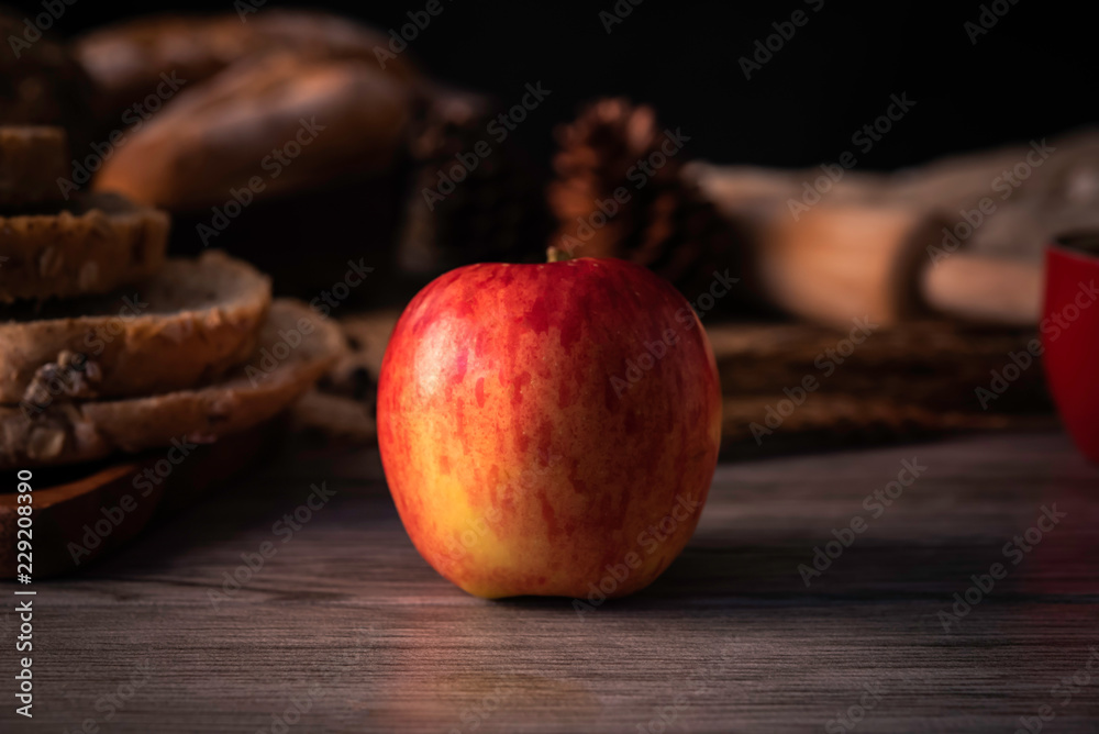Red apples are laid on a wooden floor - concept lifestyle Red apples are laid on a wooden floor - concept lifestyle