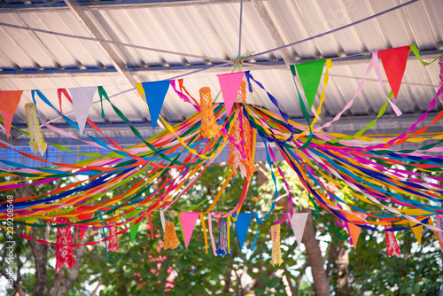 Colorful flags hanging in a beautiful line in the carnival. © photobyphotoboy