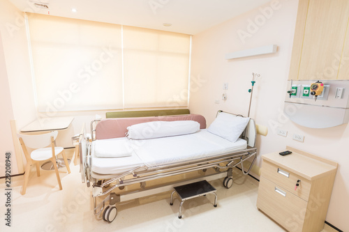 Recovery Room with bed and comfortable medical equipped in a hospital. Mattress with white cloth © warut