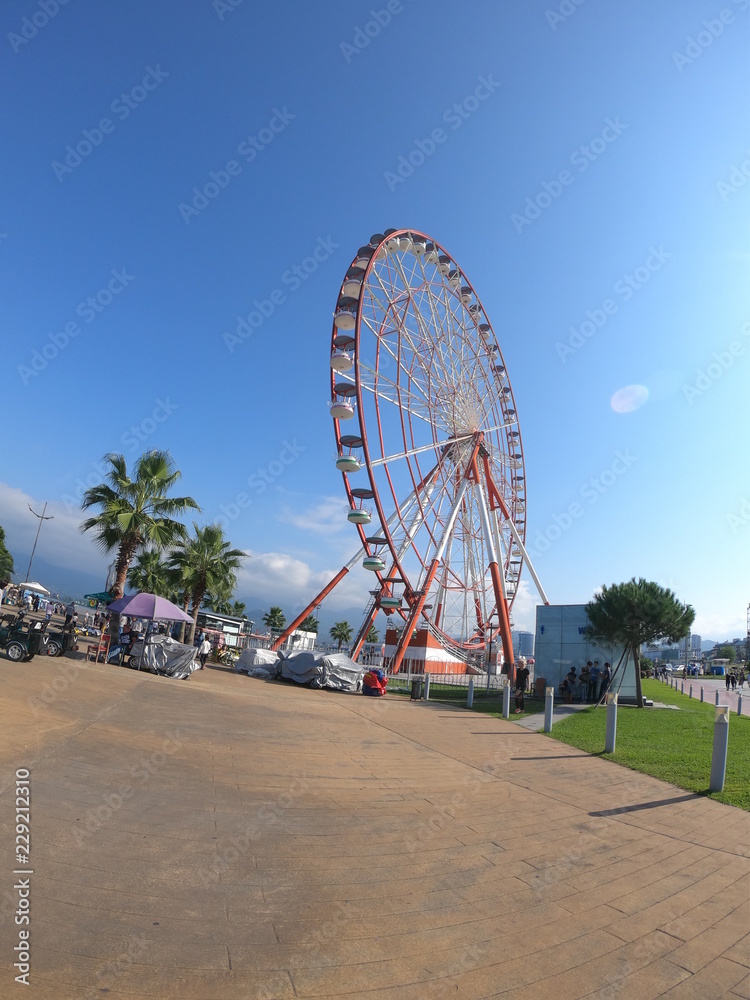 Fototapeta premium Batumi city Ferris wheel near the beach in Georgia