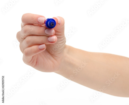 Blue marker in hand on a white background. Isolation