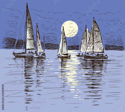Sailing yachts on a lake on a moonlit night