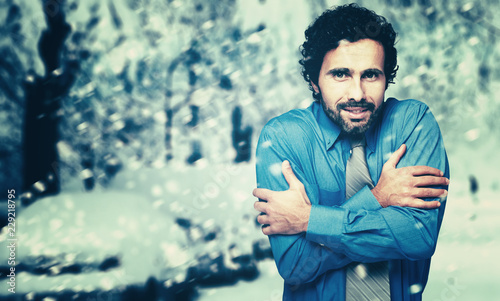 Tablou canvas Portrait of a frozen businessman in the cold winter