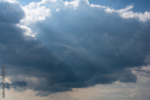 фотографія Cloudscape with stormy clouds and sun rays