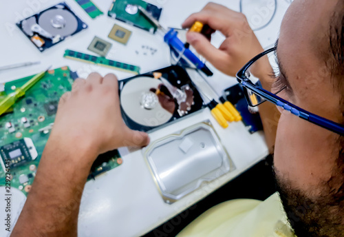 Man fixing electronics