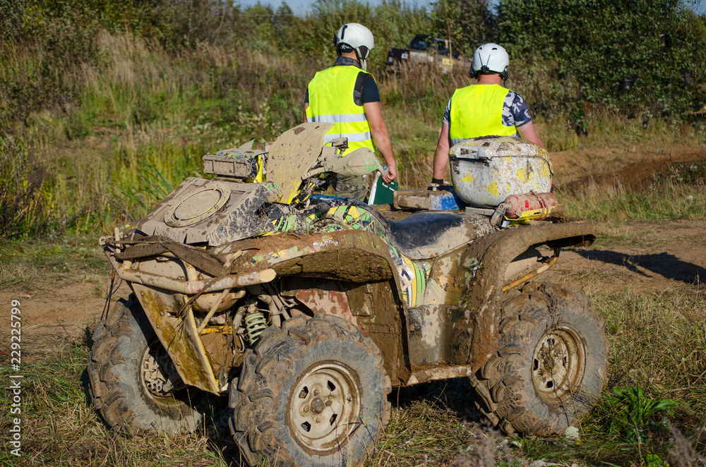 Fototapeta premium Off-road vehicles on water and mud