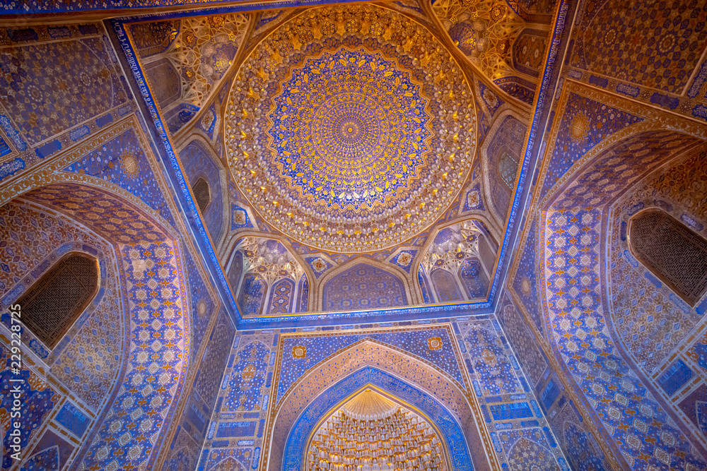 Blue interior of Tile Karl Madrasa in The Registan, Samarkand, Uzbekistan