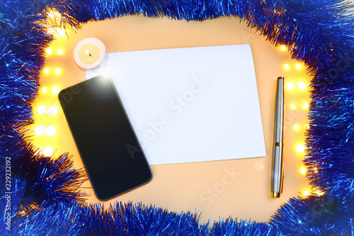 Blank paper, Christmas decorations and gifts. Write Christmas wishes, writing, deeds.