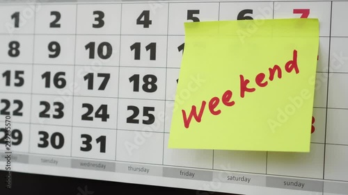 Office calendar, stickers and inscription Weekend.