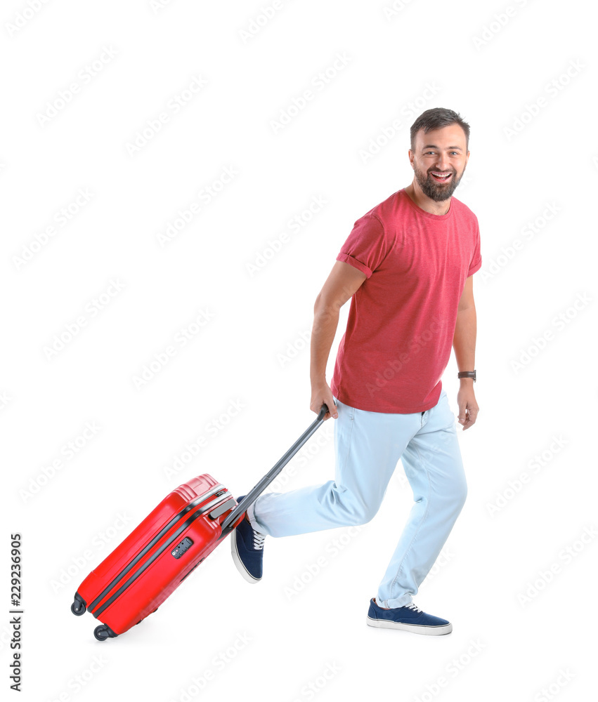 Man with suitcase running on white background. Vacation travel