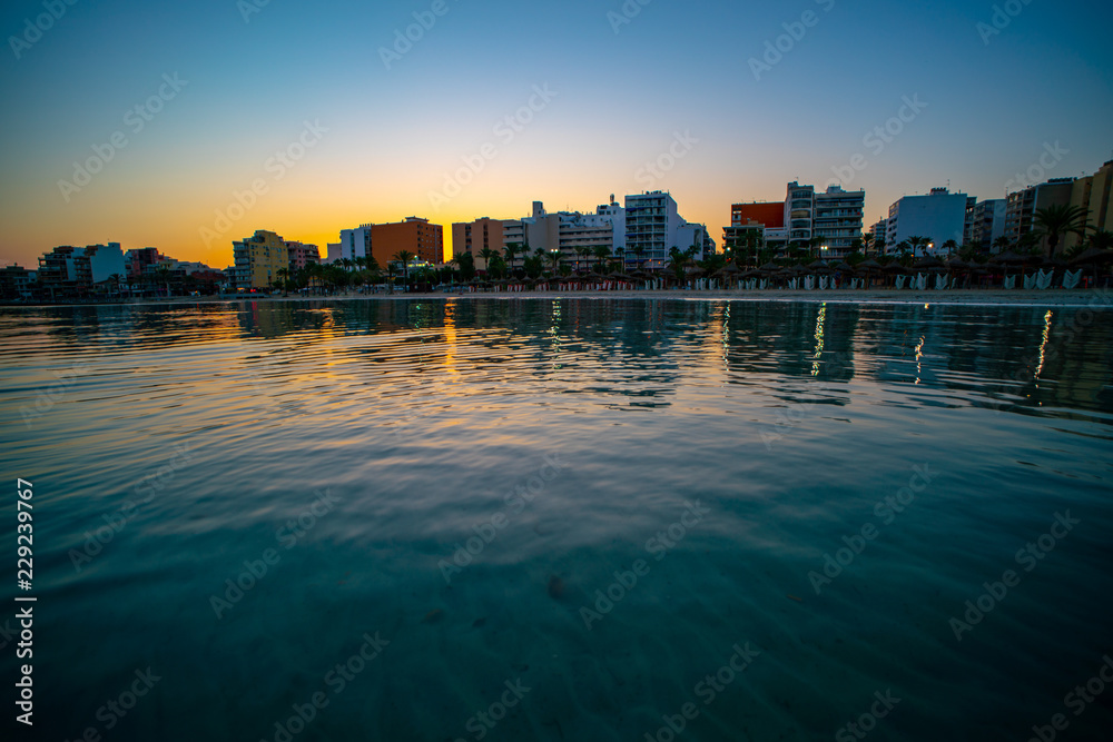 Fototapeta premium Summer sunset with small waves on the Atlantic coast