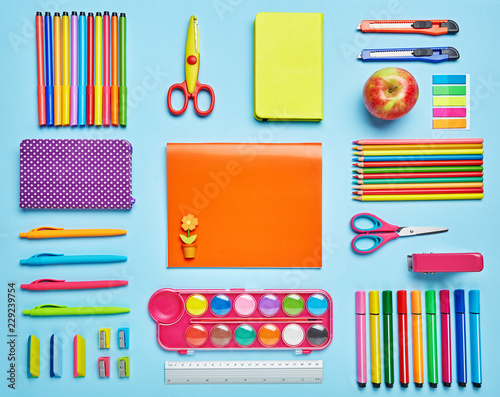 Bright composition of school stationery. Group stationery set forth in composition.