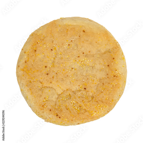 Overhead view of a large size freshly baked English muffin isolated on a white background. © Bert Folsom