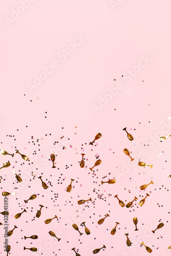 Party confetti background in stylish gold colors. Festive concept. photo