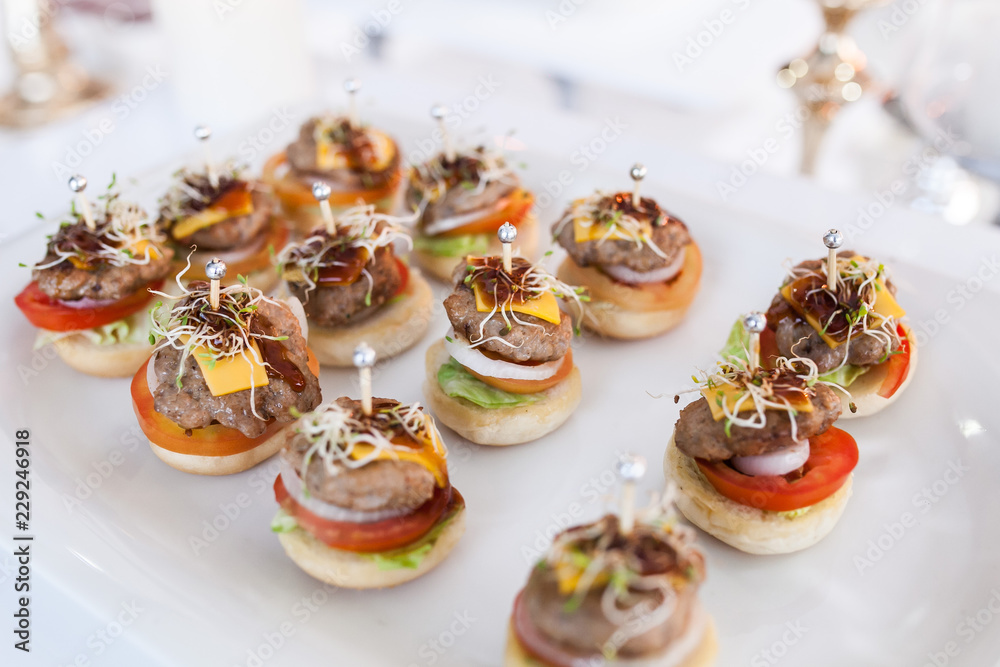 Fototapeta premium Party catering Cocktail food on a mini dish and tiny glass bowls.