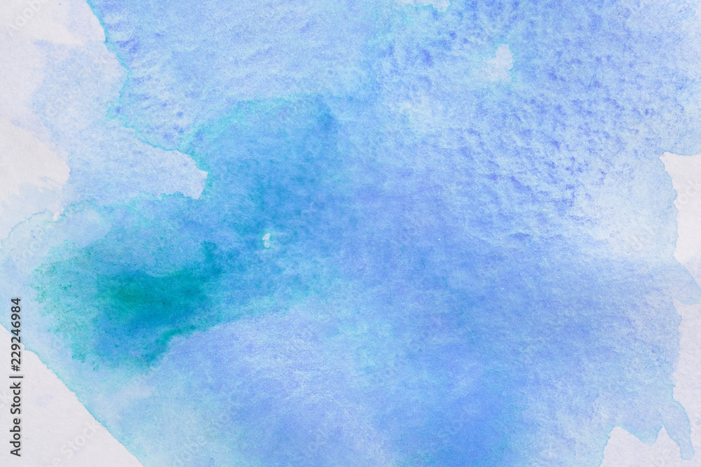 blue texture paint watercolor background on paper with a texture and a touch of aquamarine