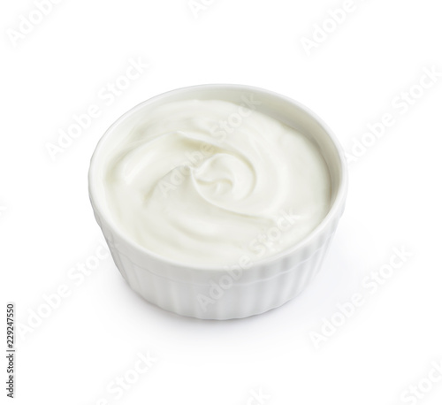 bowl of sour cream yogurtisolated on white background.