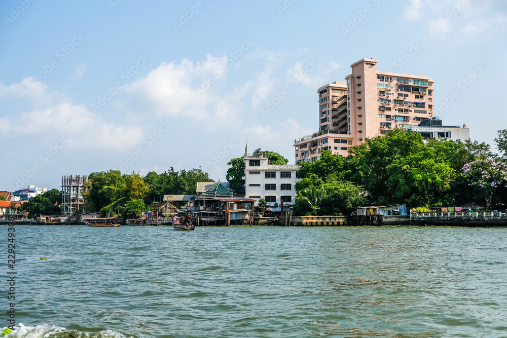 Beautiful Scenery Of The Riverfront As View From The Boat On The Chao Phraya River Bangkok, Thailand