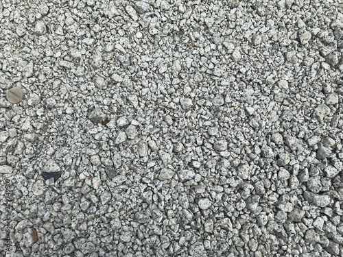 A gray gravel with simple texture © DrKlum