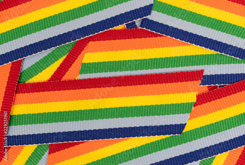 Top close view of snippets of colorful trim cloth.