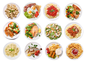 various plates of food isolated on white background, top view