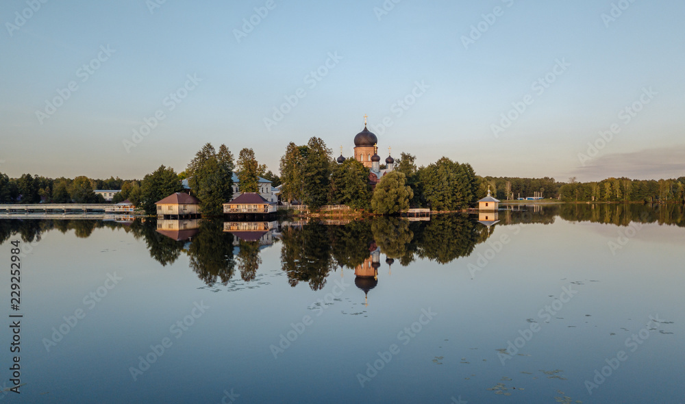 The Holy-Vvedensky nunnery in the Vladimir region. On the island. Aerial view. The Holy-Vvedensky nunnery in the Vladimir region. On the island. Aerial view.