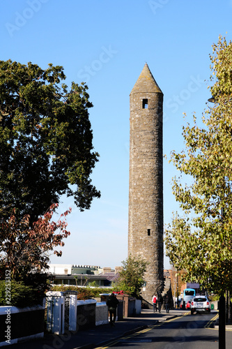 Irish round tower. The Clondalkin round tower. Historical heritage of Ireland. photo