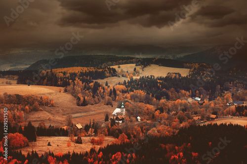 Fototapeta Naklejka Na Ścianę i Meble -  Old church in forest in autumn season time in South Poland, Beskidy mountains