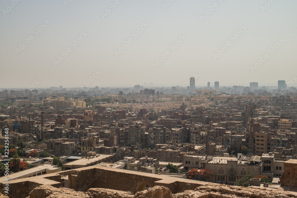Landscape view of Cairo city, On the background the Giza pyramids complex. Egypt.