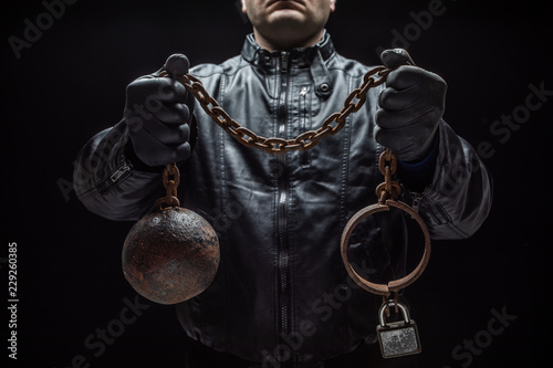 Fotografie Serial killer with chains for his victim / heloween concept