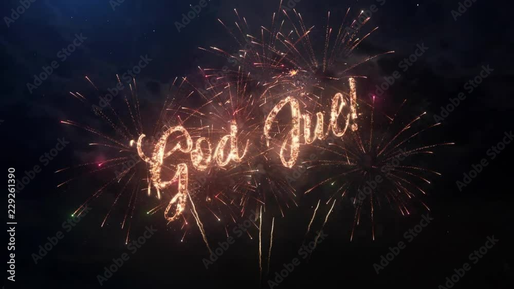 Merry Christmas greeting text in Swedish with particles and sparks on black night sky with colored slow motion fireworks on background, beautiful typography magic design.
