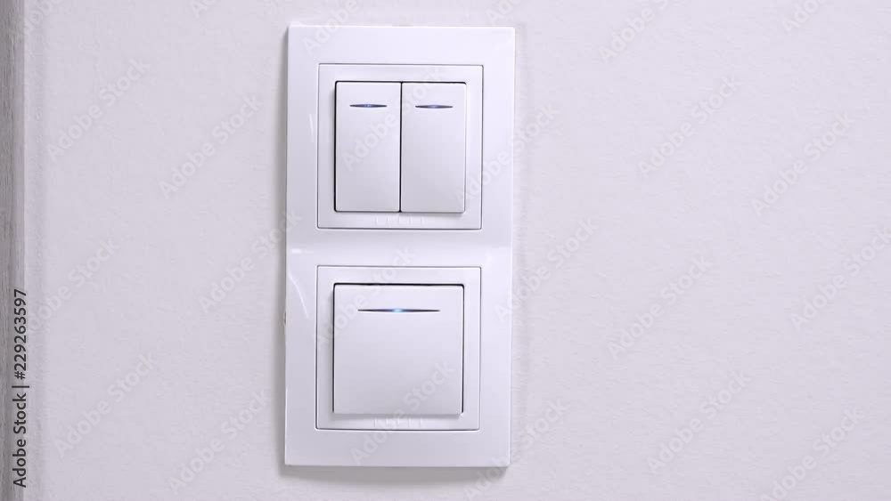 Three white lighting switch at the apartment Three white lighting switch at the apartment