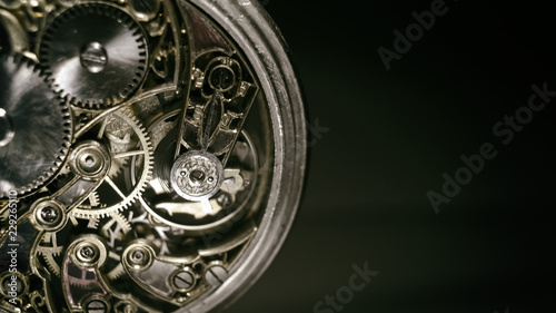 antique mechanical pocket watch, winter time and summer time concept, selective focus.