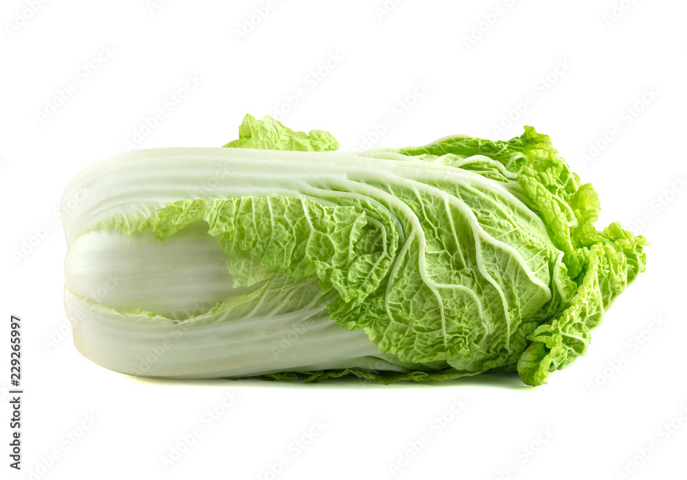 Peking cabbage on a white background. Fresh Peking cabbage close up isolated on white background. Peking cabbage on a white background. Fresh Peking cabbage close up isolated on white background.