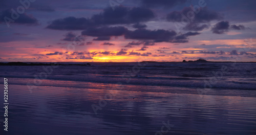 Beautiful out of focus background plate of orange  purple and blue sunset