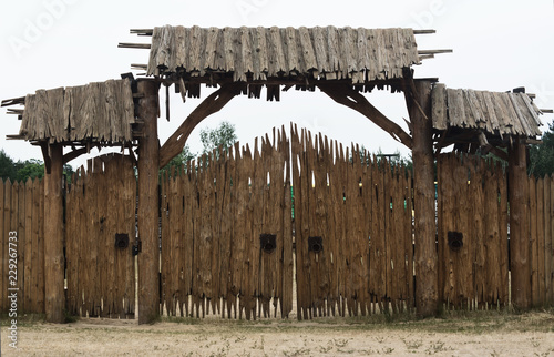 Fényképezés ancient wooden gate of the fort