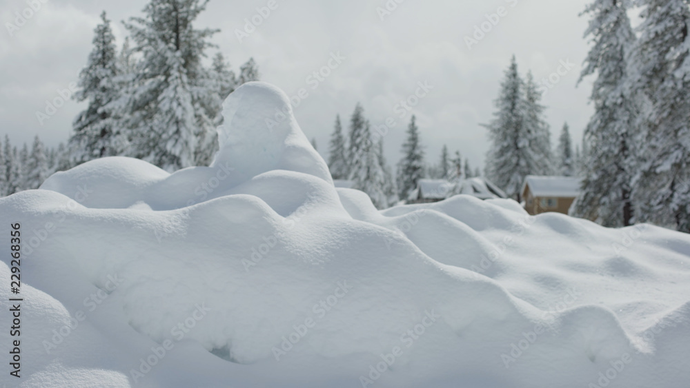 A very large snow mound in a suburban neighborhood for background plate A very large snow mound in a suburban neighborhood for background plate