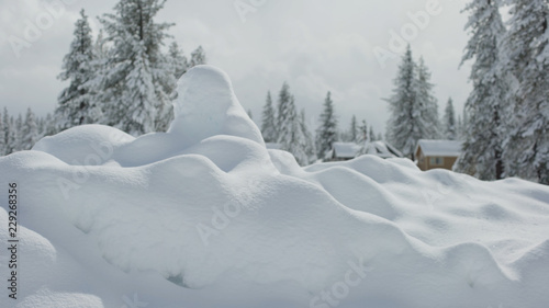 A very large snow mound in a suburban neighborhood for background plate © rocketclips