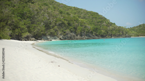 Background Plate of White sands and blue waters of a Caribbean shoreline © rocketclips