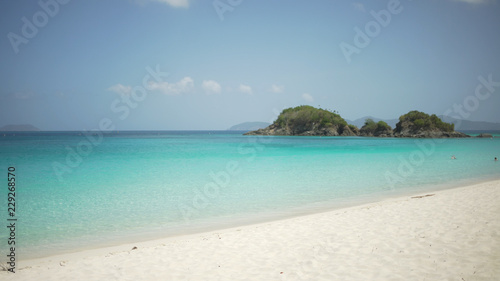Background Plate of Tide crashing on a tranquil Caribbean beach © rocketclips